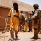 Troops from the Malian Armed Forces and members of a French military medical unit in Ndaki, Mali, July, 2019.